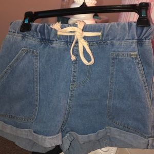 Denim shorts with white drawstrings